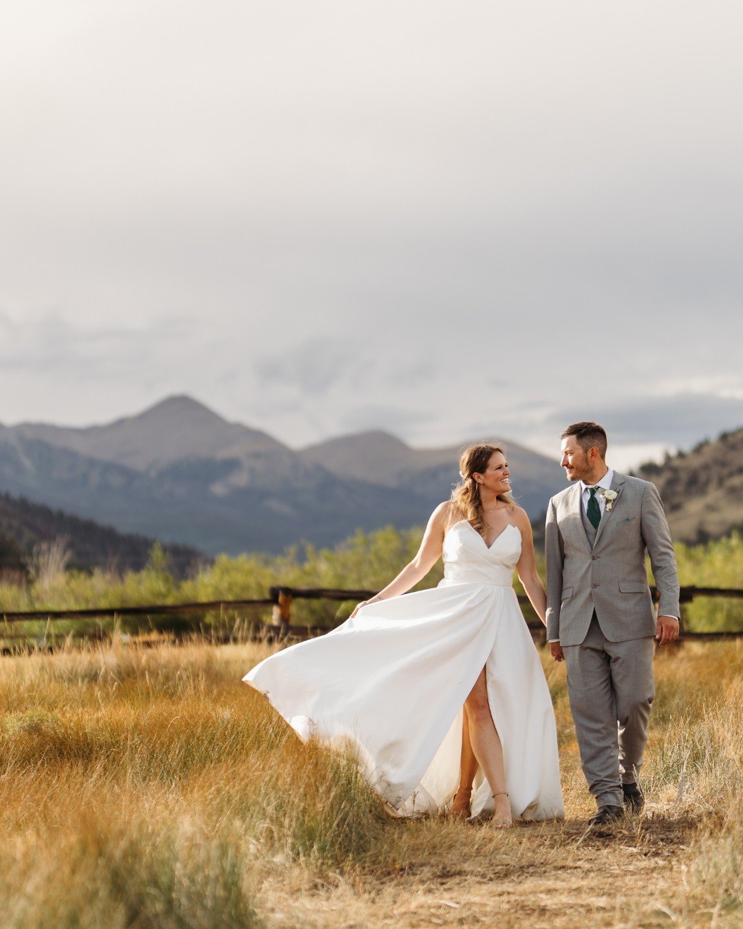 mountain-view-with-happy-couple-in-the-field